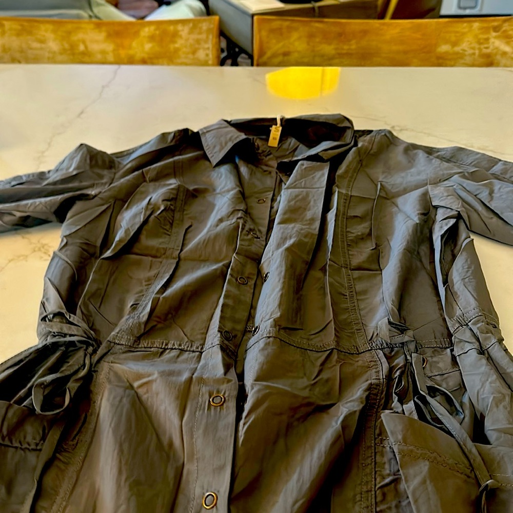 Women’s jumpsuit, silky type material, never worn.
